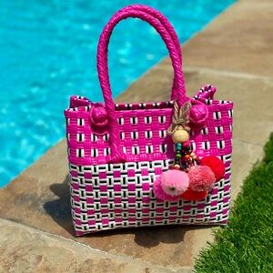 Chic Pink and White Woven Hand Bag with Pom Poms